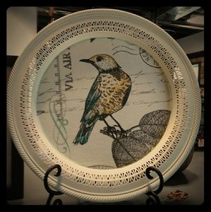 Cream colored yellow and teal bird decorative plat